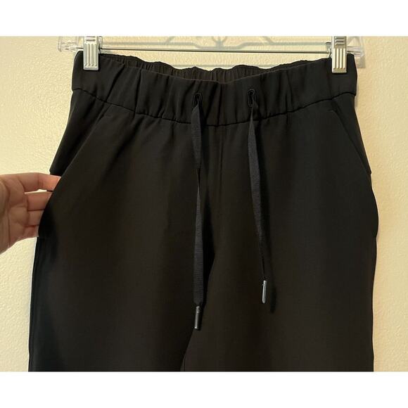 Lululemon On The Fly Pant 7/8 Women's Size 2 Black LW5BPMS 27" Inseam Pull On - Picture 4 of 11